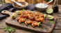 Brochettes de crevettes au miel piquant et ail ,épicées au gingembre